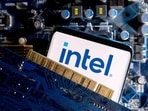 A smartphone with a displayed Intel logo is placed on a computer motherboard in this illustration taken March 6, 2023.