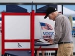 MINNEAPOLIS, MINNESOTA - SEPTEMBER 20: Voters fill out their ballots at the Minneapolis Elections & Voter Services building on September 20, 2024 in Minneapolis, Minnesota. Today is the first day of early voting in Minnesota ahead of the 2024 presidential election this November.   Stephen Maturen/Getty Images/AFP (Photo by Stephen Maturen / GETTY IMAGES NORTH AMERICA / Getty Images via AFP)