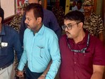 Kolkata: CBI officials take Ex-RG Kar College principal Sandip Ghosh, in blue shirt, to the court, in Kolkata, Tuesday. Sept. 10 ,2024. Ghosh was arrested by the CBI in connection with financial irregularities. (PTI Photo) Kolkata: CBI officials take Ex-RG Kar College principal Sandip Ghosh, in blue shirt, to the court, in Kolkata, Tuesday. Sept. 10 ,2024. Ghosh was arrested by the CBI in connection with financial irregularities. (PTI Photo)