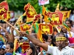 Supporters of Sri Lanka's president and United National Party presidential candidate Ranil Wickremesinghe during an election rally (Photo by Ishara S. KODIKARA / AFP) Supporters of Sri Lanka's president and United National Party presidential candidate Ranil Wickremesinghe during an election rally (Photo by Ishara S. KODIKARA / AFP)