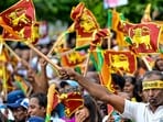 Supporters of Sri Lanka's president and United National Party presidential candidate Ranil Wickremesinghe during an election rally (Photo by Ishara S. KODIKARA / AFP) (HT_PRINT)