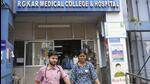 Junior doctors come out of the trauma centre at RG Kar Medical College and Hospital after they rejoined their duty partially in Kolkata on Saturday. (PTI)