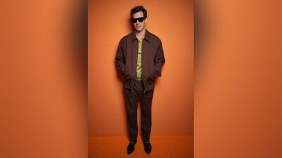 Mark Ronson pulled off a stylish ensemble featuring black sunglasses, a brown jacket, matching pants, and a light green shirt beneath. (Instagram) Mark Ronson pulled off a stylish ensemble featuring black sunglasses, a brown jacket, matching pants, and a light green shirt beneath. (Instagram)
