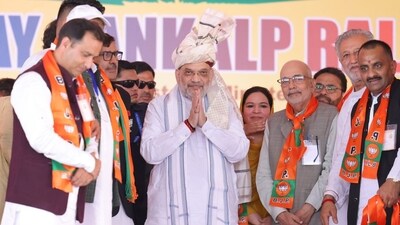 Union home minister Amit Shah acknowledges supporters at an election rally in Jammu and Kashmir. Union home minister Amit Shah acknowledges supporters at an election rally in Jammu and Kashmir.