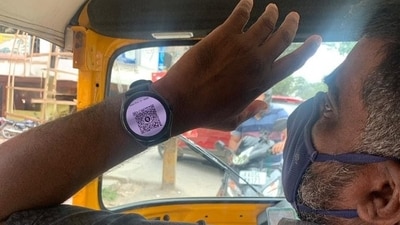 A social media post featuring a picture of the auto driver with his tech-savvy smartwatch and QR code has gone viral, garnering over 488,000 views and 24,000 likes. (X) A social media post featuring a picture of the auto driver with his tech-savvy smartwatch and QR code has gone viral, garnering over 488,000 views and 24,000 likes. (X)
