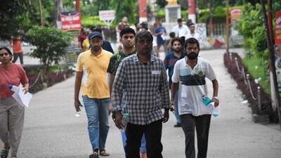 Candidates are seen coming out after attempting the UPSC Civil Services Main Examination at an examination centre in Patna. (Santosh Kumar ) Candidates are seen coming out after attempting the UPSC Civil Services Main Examination at an examination centre in Patna. (Santosh Kumar )