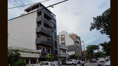 In a stilt plus four building, the ground floor is raised above the ground level by creating an open space on pillars or stilts, mostly used for parking, with four additional floors above it. (Sant Arora/HT)
