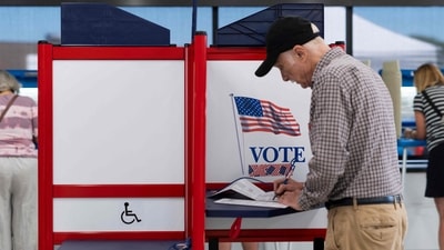 MINNEAPOLIS, MINNESOTA - SEPTEMBER 20: Voters fill out their ballots at the Minneapolis Elections & Voter Services building on September 20, 2024 in Minneapolis, Minnesota. Today is the first day of early voting in Minnesota ahead of the 2024 presidential election this November. Stephen Maturen/Getty Images/AFP (Photo by Stephen Maturen / GETTY IMAGES NORTH AMERICA / Getty Images via AFP) (Getty Images via AFP) MINNEAPOLIS, MINNESOTA - SEPTEMBER 20: Voters fill out their ballots at the Minneapolis Elections & Voter Services building on September 20, 2024 in Minneapolis, Minnesota. Today is the first day of early voting in Minnesota ahead of the 2024 presidential election this November. Stephen Maturen/Getty Images/AFP (Photo by Stephen Maturen / GETTY IMAGES NORTH AMERICA / Getty Images via AFP) (Getty Images via AFP)