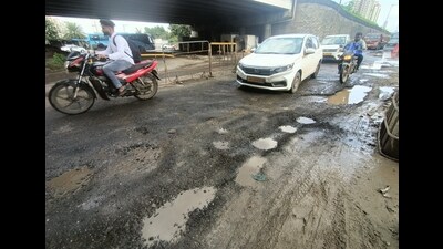 Owning to the heavy rain, many roads on Ganeshkhind Road, Baner and Pashan were riddled by potholes. (REPRESENTATIVE PIC) Owning to the heavy rain, many roads on Ganeshkhind Road, Baner and Pashan were riddled by potholes. (REPRESENTATIVE PIC)