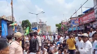 Dharavi residents were seen assembling on the road, sitting in protest against the BMC officials on Saturday. (PTI)
