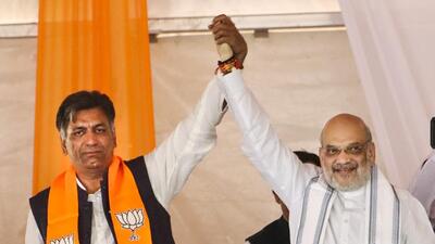 Union home minister Amit Shah with BJP’s Mendhar candidate Murtaza Khan during a rally in Poonch. (PTI) Union home minister Amit Shah with BJP’s Mendhar candidate Murtaza Khan during a rally in Poonch. (PTI)