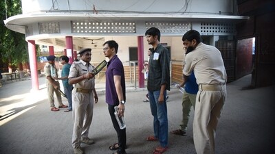 Aspirants are inspected by police before entering the exam centre in Patna to appear for UPSC CSE mains exam. (Santosh Kumar ) Aspirants are inspected by police before entering the exam centre in Patna to appear for UPSC CSE mains exam. (Santosh Kumar )