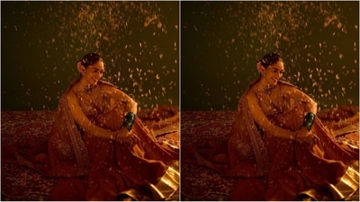 She accessorised her look with a golden choker necklace featuring green emeralds, matching oversized stud earrings, a Marathi nose pin, and green bangles stacked on her wrist. (Instagram/@mrunalthakur) She accessorised her look with a golden choker necklace featuring green emeralds, matching oversized stud earrings, a Marathi nose pin, and green bangles stacked on her wrist. (Instagram/@mrunalthakur)