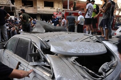 People check the damage following an Israeli strike in Beirut's southern suburbs on September 20, 2024. (AFP) People check the damage following an Israeli strike in Beirut's southern suburbs on September 20, 2024. (AFP)
