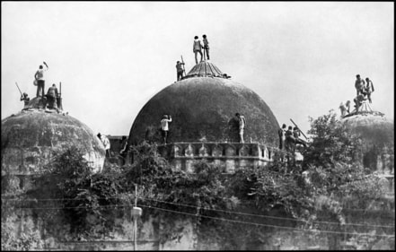Kar sevaks atop the Babri Masjid in December 1992. (SANJAY SHARMA/HT ARCHIVE) Kar sevaks atop the Babri Masjid in December 1992. (SANJAY SHARMA/HT ARCHIVE)