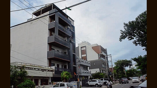 In a stilt plus four building, the ground floor is raised above the ground level by creating an open space on pillars or stilts, mostly used for parking, with four additional floors above it. (Sant Arora/HT)