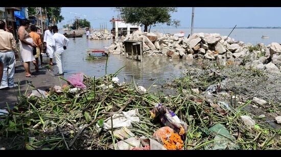 Receding water leaves behind waste in localities in Prayagraj (HT Photo)
