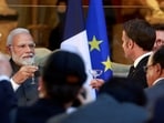 FILE PHOTO: French President Emmanuel Macron and Indian Prime Minister Narendra Modi during a dinner held at the Louvre in Paris, France, July 14, 2023.