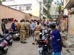 Police set up a blockade at the Bengaluru apartment where a woman’s body was found, initiating an investigation with forensic teams and canine units. 