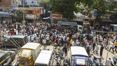 A large group of local residents gathered and blocked the civic officials from entering the lane where the mosque is situated. (PTI) A large group of local residents gathered and blocked the civic officials from entering the lane where the mosque is situated. (PTI)