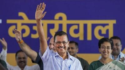 AAP chief Arvind Kejriwal with Delhi chief minister Atishi at Jantar Mantar in Delhi on Sunday. (PTI)