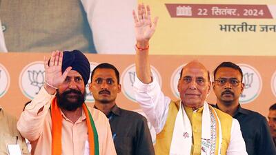 Defence minister Rajnath Singh waves to the supporters during a public rally in Jammu. (ANI) Defence minister Rajnath Singh waves to the supporters during a public rally in Jammu. (ANI)