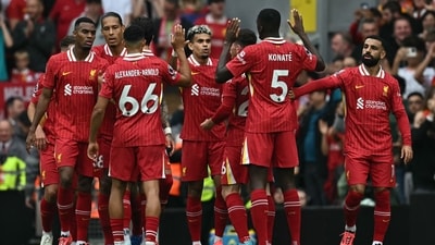 Luis Diaz (C) celebrates with teammates after scoring his team's first goal during the English Premier League football match between Liverpool and Bournemouth (AFP) Luis Diaz (C) celebrates with teammates after scoring his team's first goal during the English Premier League football match between Liverpool and Bournemouth (AFP)