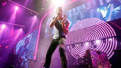 Musician Chris Martin of the band Coldplay performs onstage at the iHeartRadio Music Festival held at the MGM Grand Garden Arena on September 23, 2011 in Las Vegas, Nevada. (Christopher Polk/Getty Images North America/AFP)