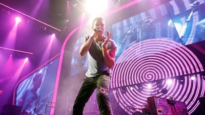 Musician Chris Martin of the band Coldplay performs onstage at the iHeartRadio Music Festival held at the MGM Grand Garden Arena on September 23, 2011 in Las Vegas, Nevada. (Christopher Polk/Getty Images North America/AFP) Musician Chris Martin of the band Coldplay performs onstage at the iHeartRadio Music Festival held at the MGM Grand Garden Arena on September 23, 2011 in Las Vegas, Nevada. (Christopher Polk/Getty Images North America/AFP)
