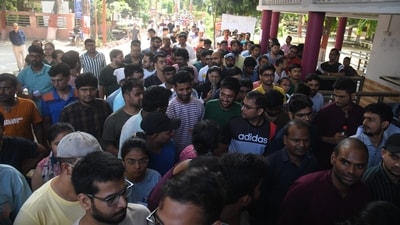 The candidates were frisked by police personnel before entering the examination center to appear for the Civil Services (Main) Examination. (Photo Credits: Santosh Kumar) The candidates were frisked by police personnel before entering the examination center to appear for the Civil Services (Main) Examination. (Photo Credits: Santosh Kumar)
