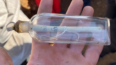Researchers unearthed a 200-year-old message in a bottle at an archaeological site in Normandy, France (Guillaume Blondel) Researchers unearthed a 200-year-old message in a bottle at an archaeological site in Normandy, France (Guillaume Blondel)