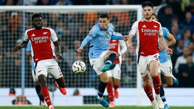 Manchester City's Phil Foden in action with Arsenal's Declan Rice. (Action Images via Reuters)