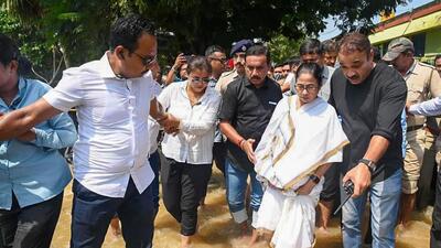 West Bengal chief minister Mamata Banerjee during a visit to a flood affected area in Medinipur district on September 19. (HT Photo) West Bengal chief minister Mamata Banerjee during a visit to a flood affected area in Medinipur district on September 19. (HT Photo)
