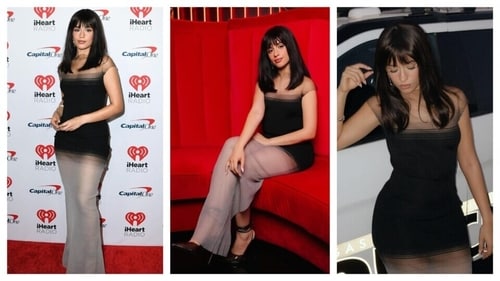 The black dress had a minimalistic elegance, with a unique play between sheer and solid panels in the dress. (Instagram/@justjared & Instagram/@iheartradio) The black dress had a minimalistic elegance, with a unique play between sheer and solid panels in the dress. (Instagram/@justjared & Instagram/@iheartradio)