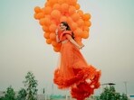 Rabeeca Khan dangled from a crane for her birthday shoot.