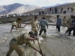 In this Aug. 13, 2010 file photo, personnel of Border Road Organization and local volunteers work to stop the overflowing water of Indus river which was damaging a highway near Leh. Recently, India had formally notified Pakistan to “review” and “modify” the Indus Waters Treaty (IWT) under Article XII (3) of the treaty. (PTI File Photo)