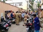 Bengaluru: Police and locals near the crime scene after a woman was allegedly murdered in Malleswaram. 