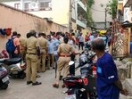 Bengaluru: Police and locals near the crime scene after a woman was allegedly murdered in Malleswaram. 