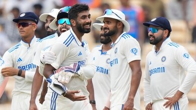 India's Jasprit Bumrah, centre, celebrates with teammates during the first Test against Bangladesh. (AP) India's Jasprit Bumrah, centre, celebrates with teammates during the first Test against Bangladesh. (AP)
