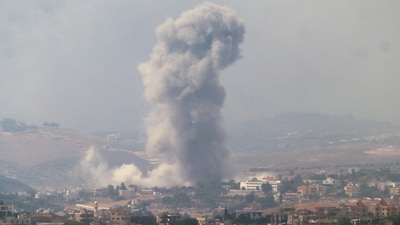 Smoke billows from a site targeted by Israeli shelling in the southern Lebanese village of Khiam in Marjeyoun on September 23, 2024. The Israeli military on September 23 told people in Lebanon to move away from Hezbollah targets and vowed to carry out more "extensive and precise" strikes against the Iran-backed group. (AFP) Smoke billows from a site targeted by Israeli shelling in the southern Lebanese village of Khiam in Marjeyoun on September 23, 2024. The Israeli military on September 23 told people in Lebanon to move away from Hezbollah targets and vowed to carry out more "extensive and precise" strikes against the Iran-backed group. (AFP)