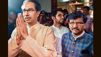 Mumbai: Shiv Sena chief Uddhav Thackeray with his son Yuva Sena chief Aditya Thackeray and Senior Shiv Sena leader Sanjay Raut leave after a meeting with NCP and Congress leaders, at Nehru Centre in Mumbai, Friday, Nov. 22, 2019. (PTI Photo) (PTI11_22_2019_000308B) (PTI) Mumbai: Shiv Sena chief Uddhav Thackeray with his son Yuva Sena chief Aditya Thackeray and Senior Shiv Sena leader Sanjay Raut leave after a meeting with NCP and Congress leaders, at Nehru Centre in Mumbai, Friday, Nov. 22, 2019. (PTI Photo) (PTI11_22_2019_000308B) (PTI)