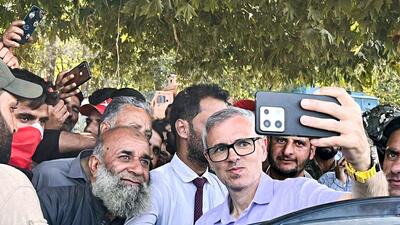 National Conference vice-president Omar Abdullah takes a picture with supporters during a rally in Budgam on Monday. He is contesting from two seats that go to polls in the second phase (ANI) National Conference vice-president Omar Abdullah takes a picture with supporters during a rally in Budgam on Monday. He is contesting from two seats that go to polls in the second phase (ANI)