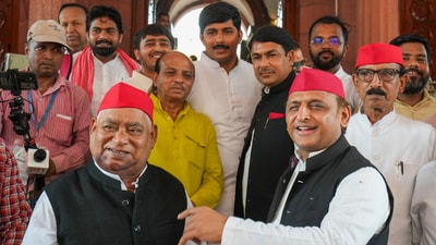 Samajwadi Party MPs Akhilesh Yadav, Awadhesh Prasad and others during the Monsoon session of Parliament in New Delhi. (PTI) Samajwadi Party MPs Akhilesh Yadav, Awadhesh Prasad and others during the Monsoon session of Parliament in New Delhi. (PTI)