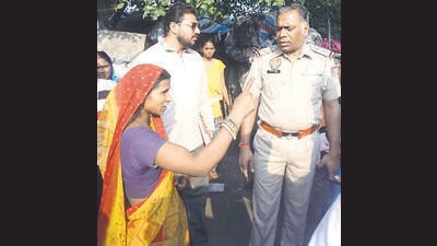 Police at the crime scene in grain market near Jalandhar Bypass in Ludhiana on Monday. (HT Photo) Police at the crime scene in grain market near Jalandhar Bypass in Ludhiana on Monday. (HT Photo)