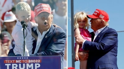 Donald Trump shares warm moments with his grandchildren at NC rally  (AP Photo/Chris Seward, photo by Anna Moneymaker / GETTY IMAGES NORTH AMERICA / Getty Images via AFP)