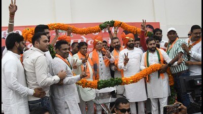 Uttarakhand chief minister and BJP leader Pushkar Singh Dhami canvassing for party candidate Gian Chand Gupta in Panchkula on Monday. (Sant Arora/Hindustan Times)