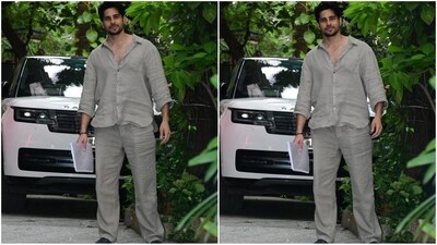 Sidharth Malhotra rocks a casual look in a co-ord set featuring a grey cotton loose-fit shirt and matching pants. He pulls off the monochrome vibe with effortless flair. (HT photo/VarinderChawla) Sidharth Malhotra rocks a casual look in a co-ord set featuring a grey cotton loose-fit shirt and matching pants. He pulls off the monochrome vibe with effortless flair. (HT photo/VarinderChawla)