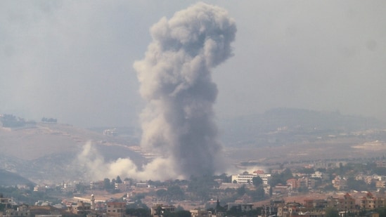 Smoke billows from a site targeted by Israeli shelling in the southern Lebanese village of Khiam in Marjeyoun on September 23, 2024. The Israeli military on September 23 told people in Lebanon to move away from Hezbollah targets and vowed to carry out more "extensive and precise" strikes against the Iran-backed group. (AFP)