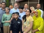 Congress leader Rahul Gandhi with family members of US-based truck driver Amit Mann at Ghogripur village in Karnal district on Friday. (HT Photo) Congress leader Rahul Gandhi with family members of US-based truck driver Amit Mann at Ghogripur village in Karnal district on Friday. (HT Photo)