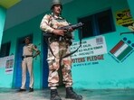 Rajouri: Security personnel stand guard outside a polling booth near Line on Control (LOC) ahead of the second phase election of Jammu and Kashmir Assembly (PTI Photo) Rajouri: Security personnel stand guard outside a polling booth near Line on Control (LOC) ahead of the second phase election of Jammu and Kashmir Assembly (PTI Photo)